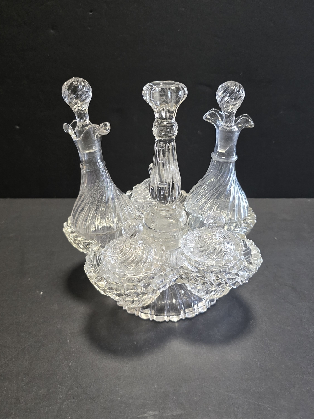 Unmarked Clear Pressed Glass Rotating Victorian Condiment Cruet Set With Lids